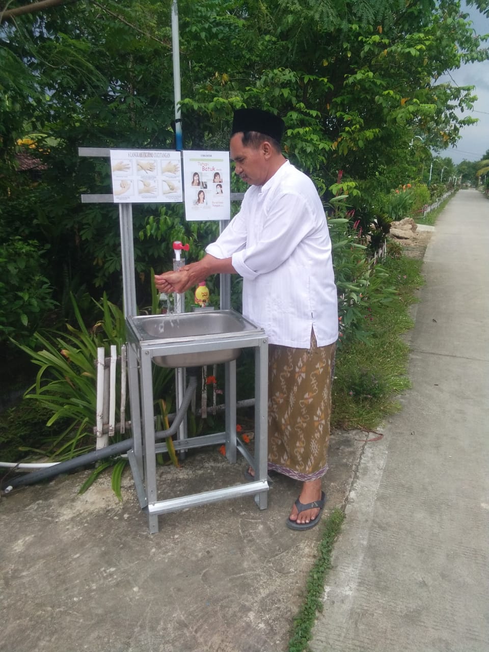 Pandemi COVID -19, Pemdes Mangunanlor Pasang Wastafel Cuci Tangan di 30 Titik