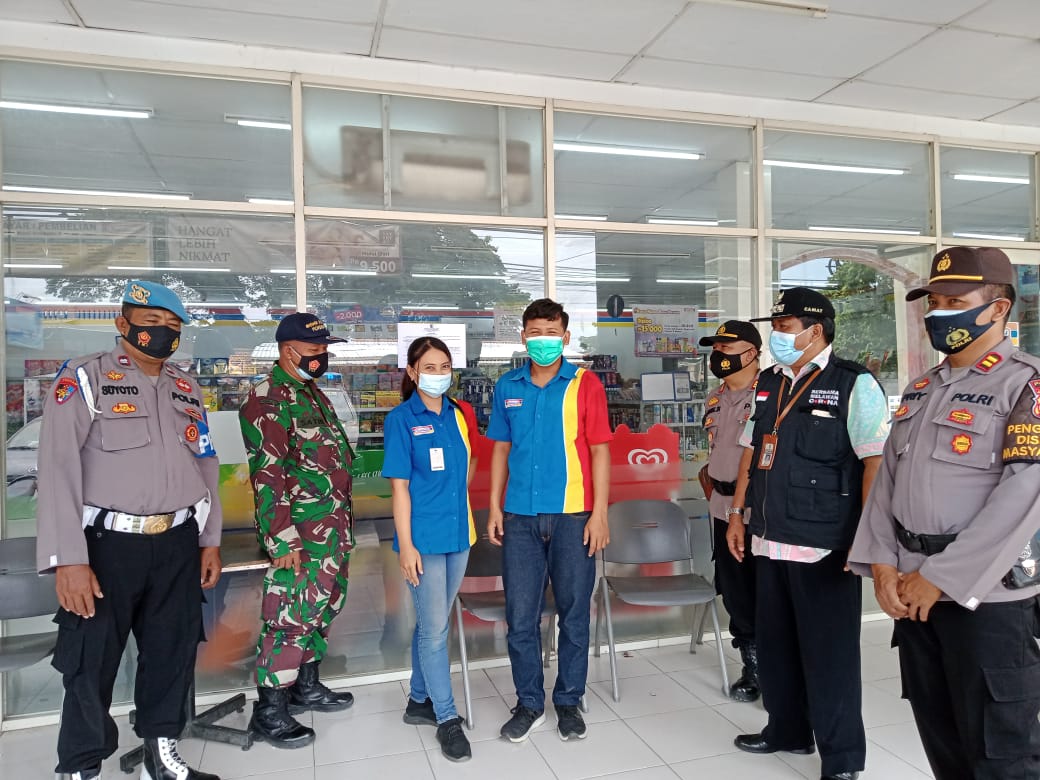 Team Gugus Covid melaksanakan sosialisasi PPKM